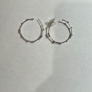 Silver hoop earrings with small gems. Barely used, from Kendra Scott.